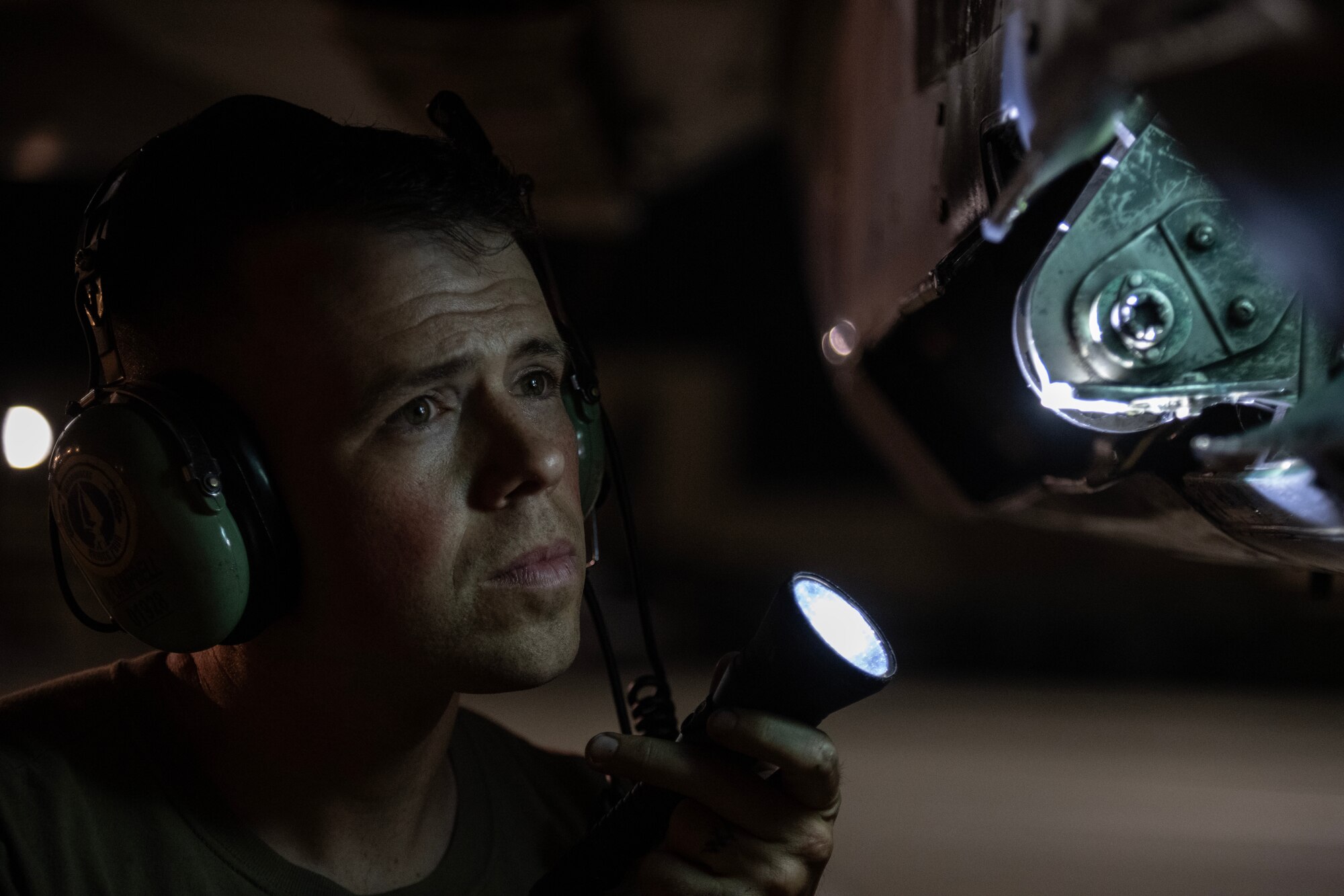 Staff Sgt. James Campbell, 334th Fighter Generation Squadron cannibalization manager, performs maintenance on an F-15E Strike Eagle.