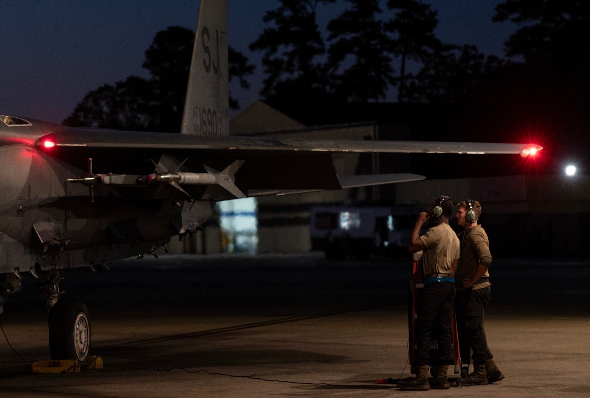 Airmen assigned to the 334th Fighter Generation Squadron conduct a maintenance inspection on an F-15E Strike Eagle.