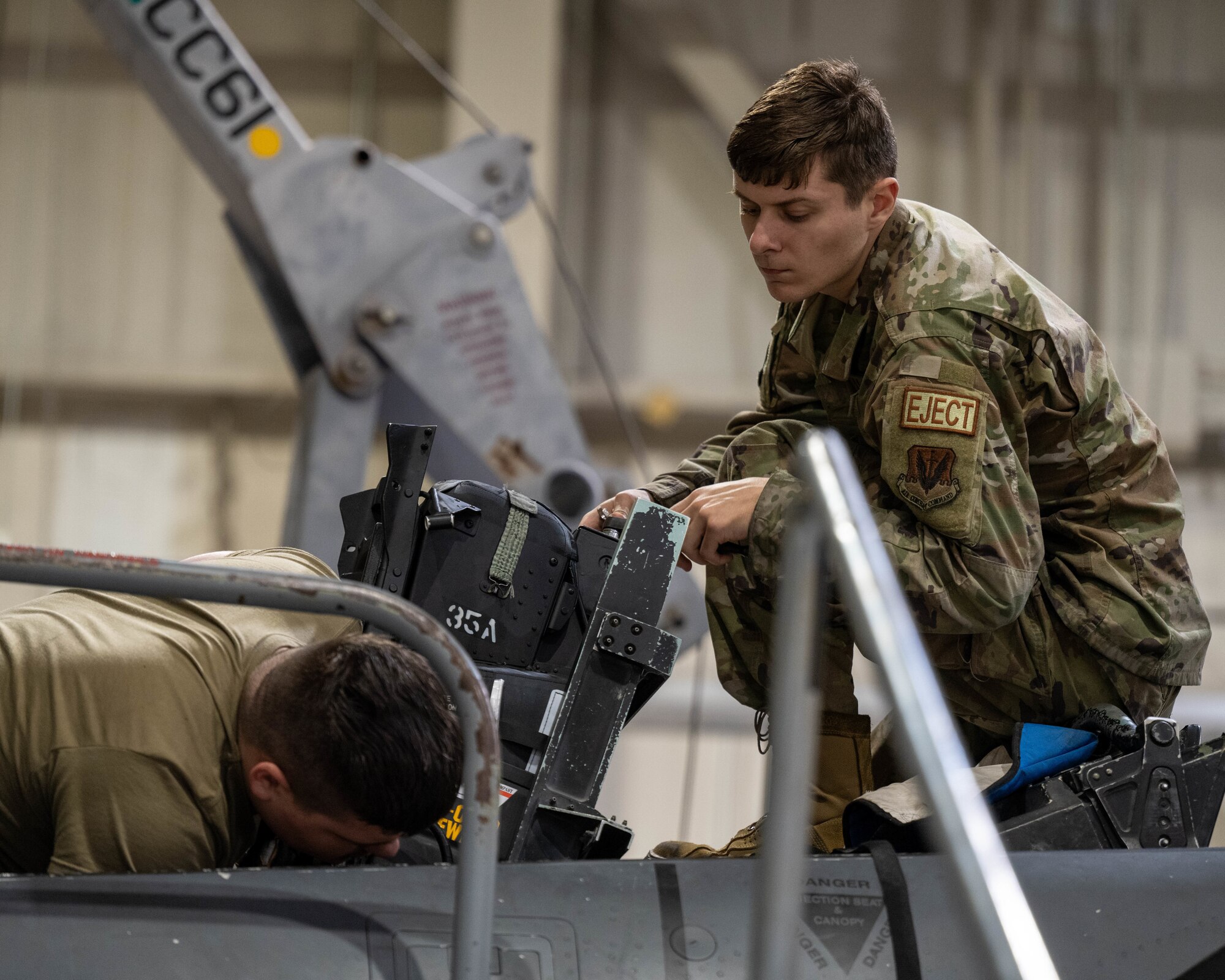Airmen assigned to the 4th Component Maintenance Squadron 
perform maintenance on an F-15E Strike Eagle.