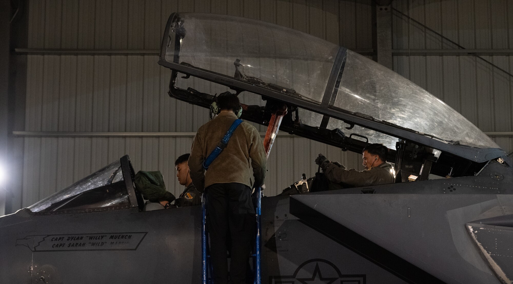 Airman 1st Class Christopher Rudan, 334th Generation Squadron assistant dedicated crew chief, performs maintenance on an F-15E Strike Eagle during a “Super Nights” training event.