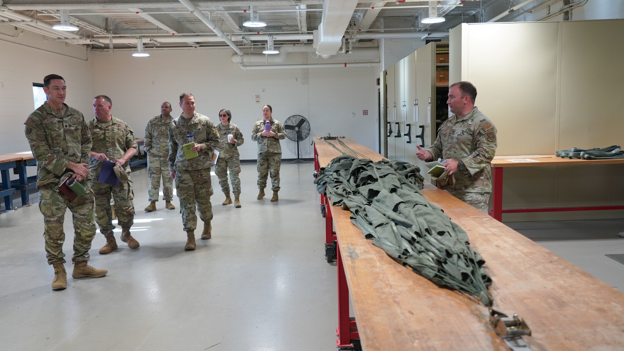 Leadership from the 403rd Wing and 81st Mission Support Group gather for a demonstration and tour of the 41st Aerial Port Squadron.