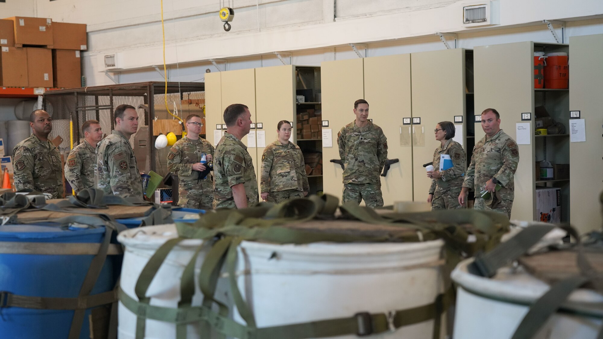 Leadership from the 403rd Wing and 81st Mission Support Group gather for a demonstration and tour of the 41st Aerial Port Squadron.