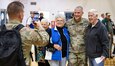 U.S. Army Lt. Gen. Charles Costanza, commanding general of V Corps, poses for a photo with Linda Perry (left) and retired Command Sgt. Maj. Walter Perry, who was formerly assigned to the 101st Airborne Division, during Retiree Appreciation Day on Oct. 18, 2024, at Fort Knox, Kentucky. Costanza took time to personally connect with attendees by acknowledging their contributions to the Army. (U.S. Army photo by Sgt. Tyler Brock)
