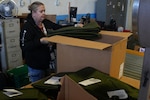 Worker in warehouse.