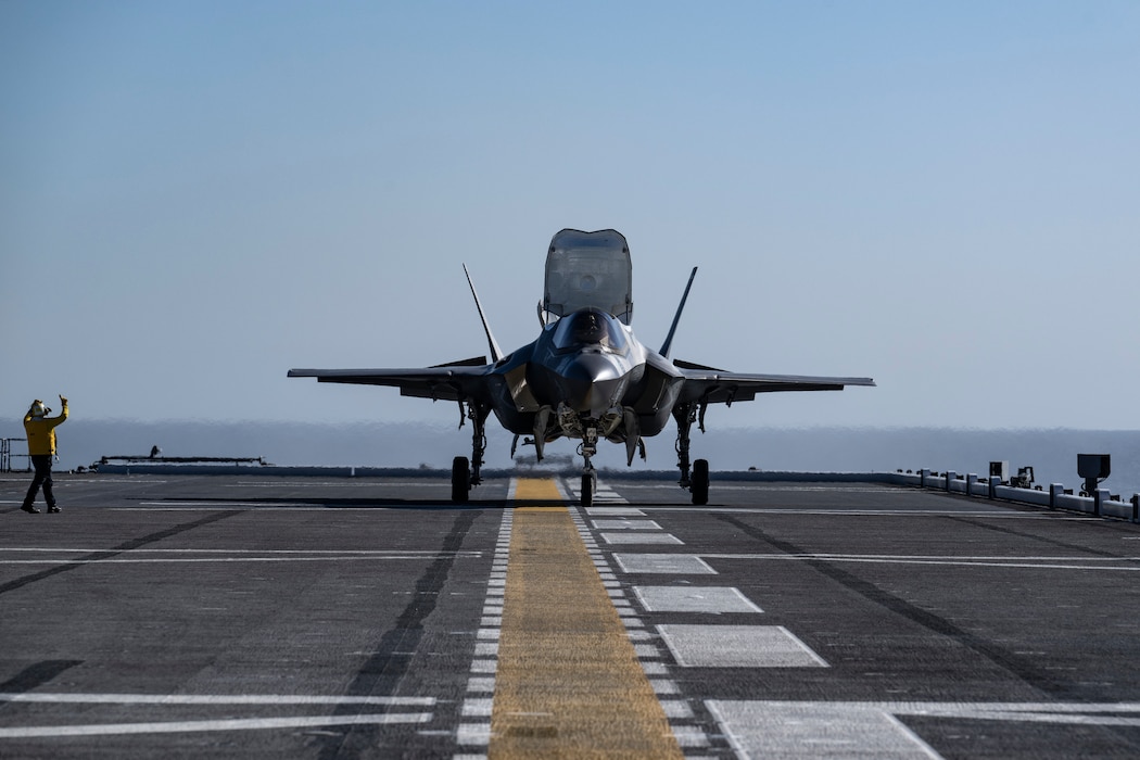 An F-35B Lightning II lands aboard JS Kaga (DDH-184) to begin developmental testing.