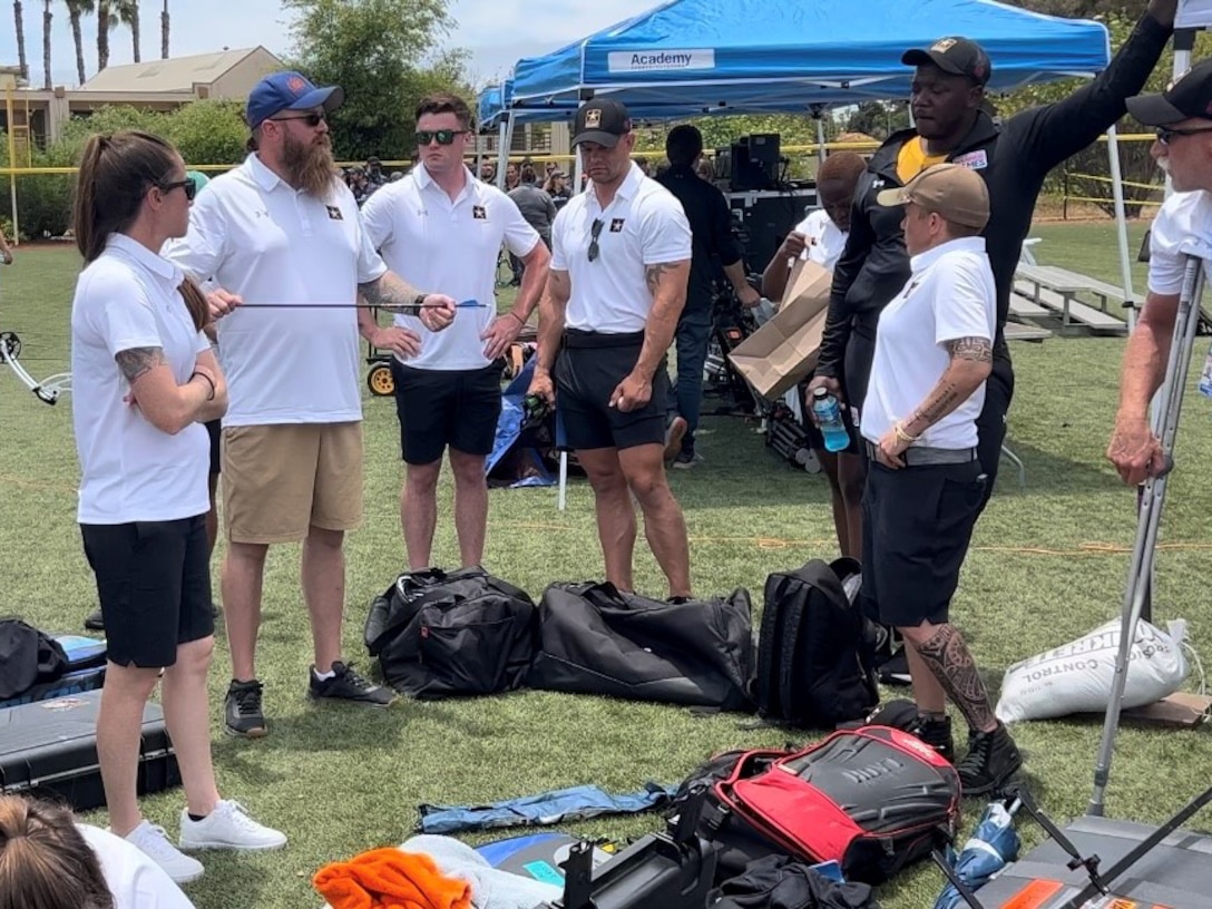 Team Army Archery Coach David Ware gives a pep talk to athletes before the archery competition at the 2023 Warrior Games Challenge