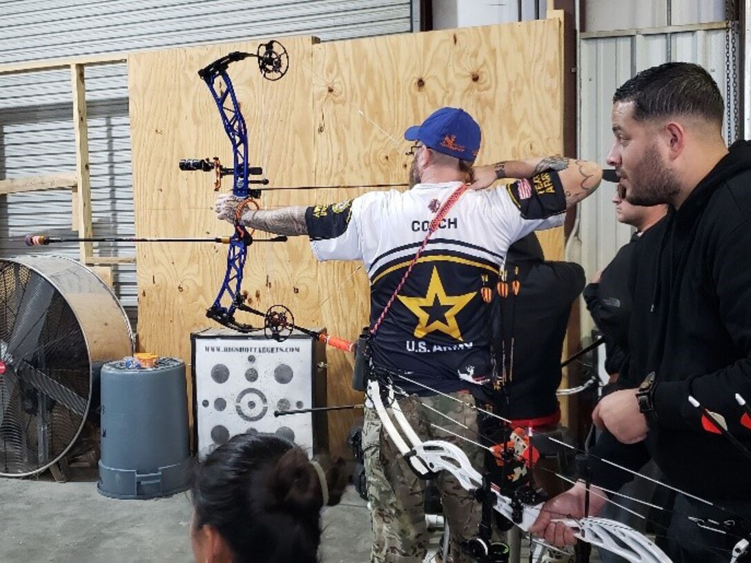 Coach David Ware is working with Soldiers at the range at Fort Liberty, North Carolina