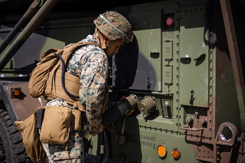 U.S. Marine Corps Cpl. Kevin Pulido, an artillery electronics technician with 12th Marine Littoral Regiment, 3d Marine Division attaches an electrical cable to an AN/TPS-80 Ground/Air Task Oriented Radar during exercise Resolute Dragon 24 at Japan Ground Self-Defense Force Camp Yonaguni, Okinawa, Japan, July 31, 2024. The radar was deployed to support training with enhanced sensing and targeting data between 12th MLR and the JSDF during RD 24. This effort aims to enhance operational readiness in the region, underscoring the U.S. Marine Corps’ commitment to maintaining peace and security in the Indo-Pacific through realistic training with innovative and proven technology. RD 24 is an annual bilateral exercise in Japan that strengthens the command, control, and multi-domain maneuver capabilities of U.S. Marines in the III Marine Expeditionary Force and Japan Self-Defense Force personnel, with a focus on controlling and defending key maritime terrain.