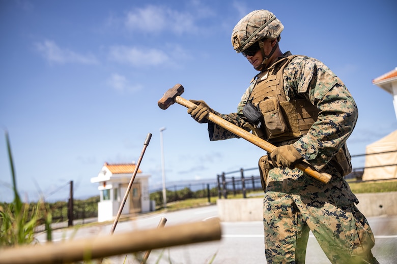 U.S. Marine Corps Lance Cpl. Ethan Richter, a field artillery radar operator with 12th Marine Littoral Regiment, 3d Marine Division hammers a AN/TPS-80 Ground/Air Task Oriented Radar ground wire during exercise Resolute Dragon 24 at Japan Ground Self-Defense Force Camp Yonaguni, Okinawa, Japan, July 31, 2024. The radar was deployed to support training with enhanced sensing and targeting data between 12th MLR and the JSDF during RD 24. This effort aims to enhance operational readiness in the region, underscoring the U.S. Marine Corps’ commitment to maintaining peace and security in the Indo-Pacific through realistic training with innovative and proven technology. RD 24 is an annual bilateral exercise in Japan that strengthens the command, control, and multi-domain maneuver capabilities of U.S. Marines in the III Marine Expeditionary Force and Japan Self-Defense Force personnel, with a focus on controlling and defending key maritime terrain.