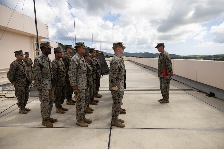 U.S. Marines with 12th Marine Littoral Regiment, 3d Marine Division stand in formation for a promotion ceremony during exercise Resolute Dragon 24 at Japan Ground Self-Defense Force Camp Ishigaki, Okinawa, Japan, Aug. 1, 2024. Cpl. Lee is the first Marine to be promoted into the noncommissioned officer ranks on JGSDF Camp Ishigaki. Cpl Lee’s responsibilities as a corporal in his military occupational specialty range from ensuring the technical and tactical proficiency of his subordinates to the management of more than $600,000 worth of communications gear. RD 24 is an annual bilateral exercise in Japan that strengthens the command, control, and multi-domain maneuver capabilities of U.S. Marines in III Marine Expeditionary Force and Japan Self-Defense Force personnel, with a focus on controlling and defending key maritime terrain.