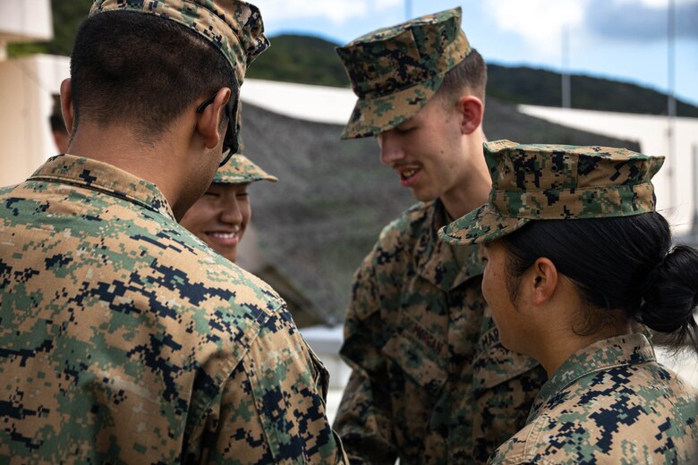 U.S. Marine Corps Lance Cpl. Chue Lee, a radio operator with 12th Marine Littoral Regiment, 3d Marine Division is pinned to the rank of corporal during exercise Resolute Dragon 24 at Japan Ground Self-Defense Force Camp Ishigaki, Okinawa, Japan, Aug. 1, 2024. Cpl. Lee is the first Marine to be promoted into the noncommissioned officer ranks on JGSDF Camp Ishigaki. Cpl Lee’s responsibilities as a corporal in his military occupational specialty range from ensuring the technical and tactical proficiency of his subordinates to the management of more than $600,000 worth of communications gear. RD 24 is an annual bilateral exercise in Japan that strengthens the command, control, and multi-domain maneuver capabilities of U.S. Marines in III Marine Expeditionary Force and Japan Self-Defense Force personnel, with a focus on controlling and defending key maritime terrain. Lee is a native of Alaska.