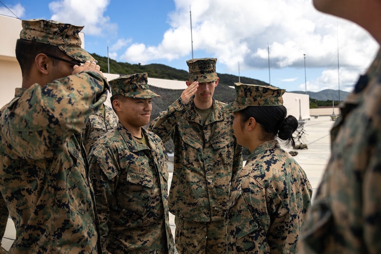U.S. Marine Corps Lance Cpl. Chue Lee, a radio operator with 12th Marine Littoral Regiment, 3d Marine Division is promoted to the rank of Corporal during exercise Resolute Dragon 24 at Japan Ground Self-Defense Force Camp Ishigaki, Okinawa, Japan, Aug. 1, 2024. Cpl. Lee is the first Marine to be promoted into the noncommissioned officer ranks on JGSDF Camp Ishigaki. Cpl Lee’s responsibilities as a Corporal in his military occupational specialty range from ensuring the technical and tactical proficiency of his subordinates to the management of more than $600,000 worth of communications gear. RD 24 is an annual bilateral exercise in Japan that strengthens the command, control, and multi-domain maneuver capabilities of U.S. Marines in III Marine Expeditionary Force and Japan Self-Defense Force personnel, with a focus on controlling and defending key maritime terrain. Lee is a native of Alaska.