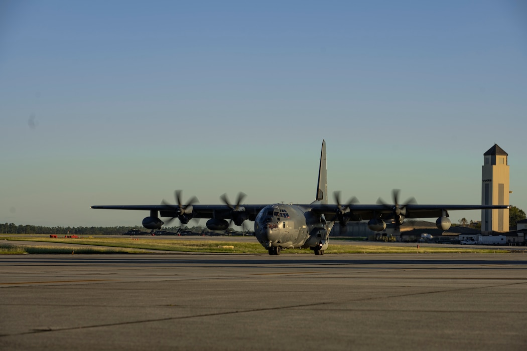 U.S. Air Force pilots assigned to the 71st Rescue Squadron taxi an HC-130J Combat King II