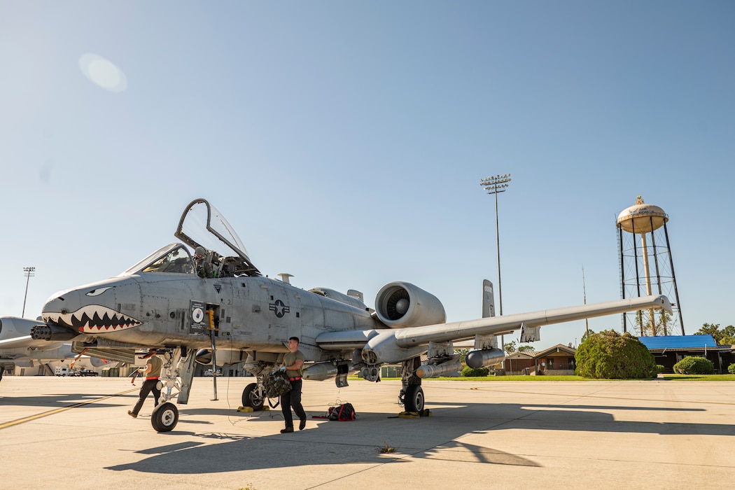 A U.S. Air Force Airman assigned to the 23rd Fighter Group conducts post-flight checks on an A-10C Thunderbolt II