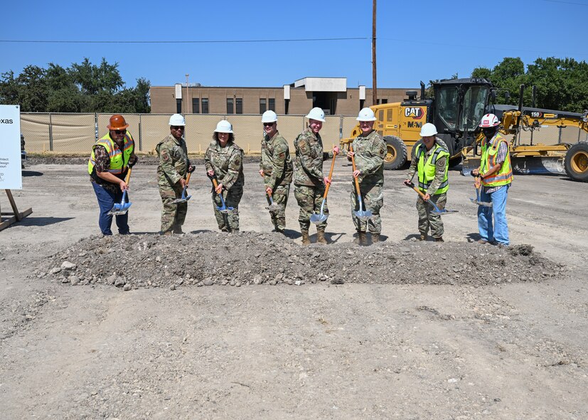 Military and civilian leaders pose for new Dental Clinic's groundbreaking ceremony