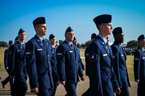 More than 800 Airmen and Guardians assigned to Flights 643-660 march in the 737th Training Group’s graduation parade, at Joint Base San Antonio-Lackland, Texas, Oct. 17, 2024. More than 800 Guardians and Airmen assigned to Flights 643-660 marched in the 737th Training Group’s graduation parade for which Saltzman was the reviewing official. The ceremony is one of three U.S. Air Force and Space Force Basic Military Training graduation events and signifies the transition from trainee to Airman or Guardian. (U.S. Air Force photo by Jonathan Cotto)