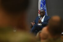 Kenneth McNeill, the chief information officer with the National Guard Bureau, responds to a question during a panel discussion on cybersecurity at the Herbert R. Temple Army National Guard Readiness Center, Arlington Hall Station in Arlington, Virginia, Oct. 16, 2024. The panel included cyber officials from throughout the Department of Defense and Department of Homeland Security and was held as part of Cybersecurity Awareness Month.