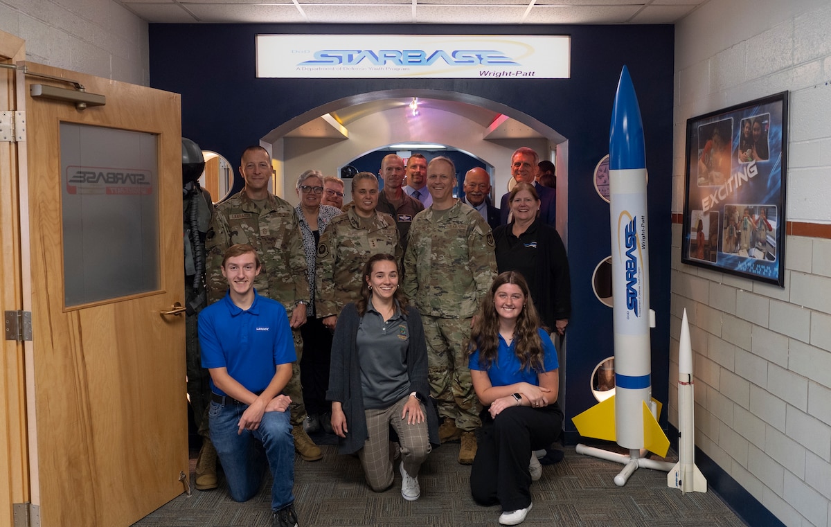 Air Force Research Laboratory leaders and community members pose for a group photo at the 20th anniversary celebration of the Department of Defense STARBASE Wright-Patt program Oct. 4, 2024, at a Child Development Center on Spinning Road in Dayton, Ohio. STARBASE Wright-Patt is a K-12 DOD science, technology, engineering and math outreach program managed by the Wright-Patterson Air Force Base Education Outreach Office that is primarily focused on fifth-grade students. Wright-Patterson Air Force Base was one of the first active-duty bases to launch a STARBASE program, and since 2003, more than 47,000 students have participated at Wright-Patt. (U.S. Air Force photo / Keith Lewis)