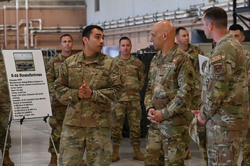 U.S. Air Force Staff Sgt. Brian Costilla, 363rd Training Squadron instructor, provides a weapons brief to Lt. Gen. Brian Robinson, commander of the Air Education and Training Command,