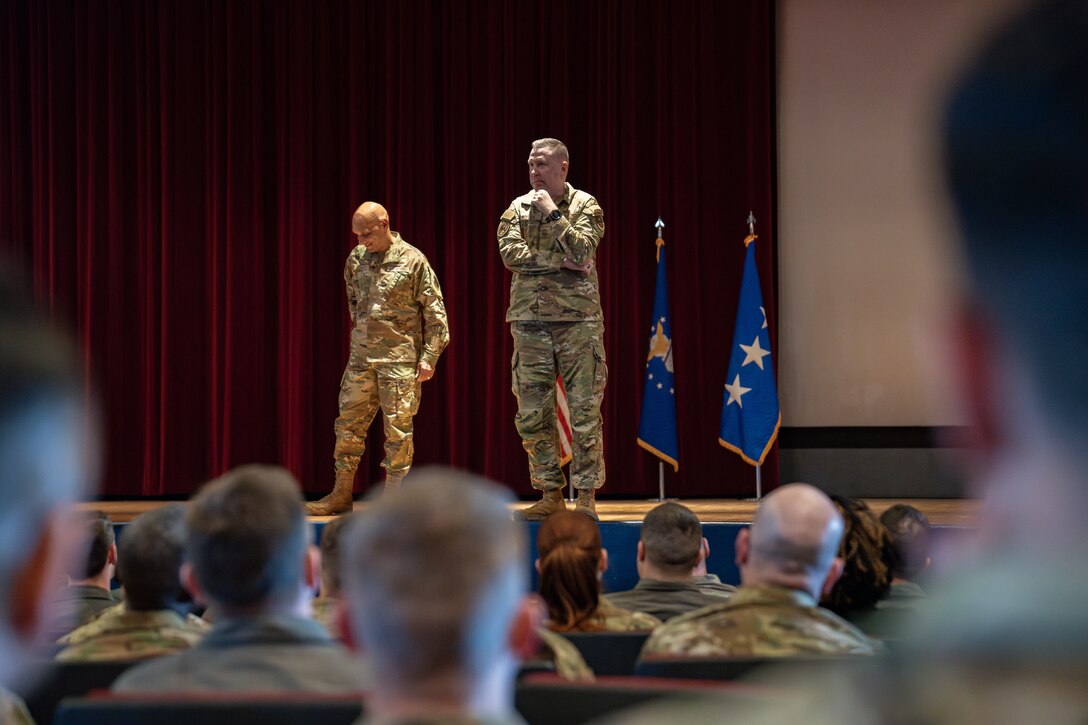 U.S. Air Force Lt. Gen. Brian Robinson, commander of Air Education and Training Command, and Chief Master Sgt. Chad Bickley, command chief of AETC, speak during an all call