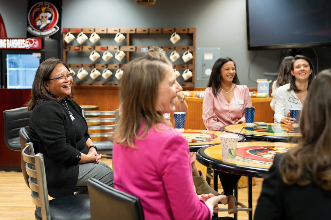 Mrs. Maureen Robinson, spouse of U.S. Air Force Lt. Gen. Brian Robinson, commander of Air Education and Training Command, enjoys a discussion with Senior National Representative Spouses from the 80th Flying Training Wing