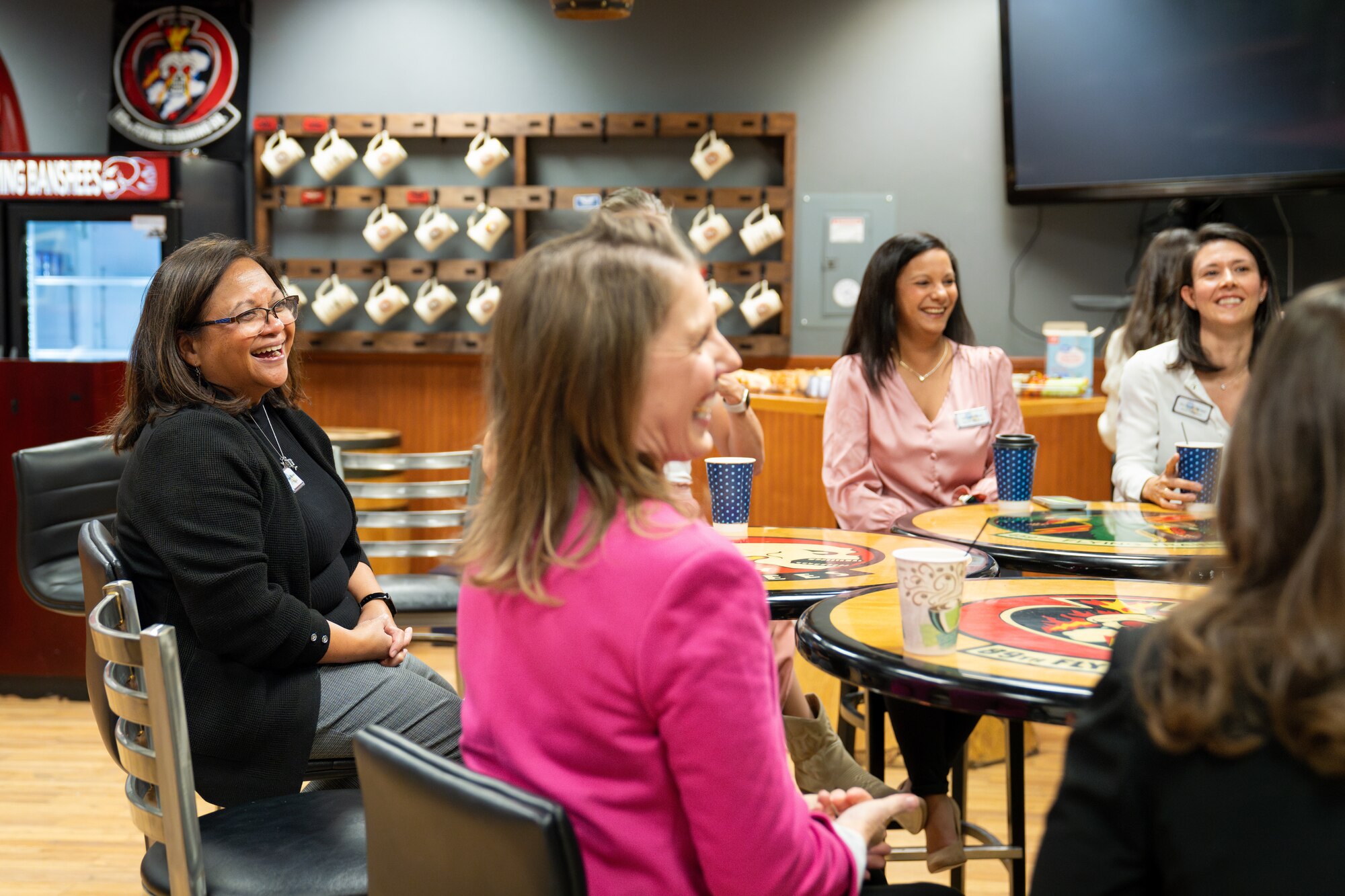 Mrs. Maureen Robinson, spouse of U.S. Air Force Lt. Gen. Brian Robinson, commander of Air Education and Training Command, enjoys a discussion with Senior National Representative Spouses from the 80th Flying Training Wing