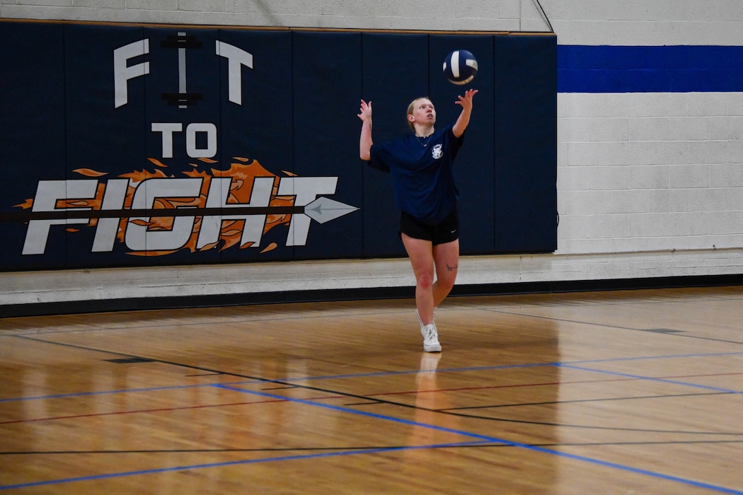 U.S. Air Force Senior Airman Tessah Moak, 97th Force Support Squadron installation personnel readiness technician, serves a volleyball during the 97th Mission Support Group sports day event at Altus Air Force Base, Oklahoma, Oct. 18, 2024. Increasing physical activity increases strength and coordination and reduces the chance for future injuries, ensuring Airmen are fit to fight. (U.S. Air Force photo by Senior Airman Miyah Gray)