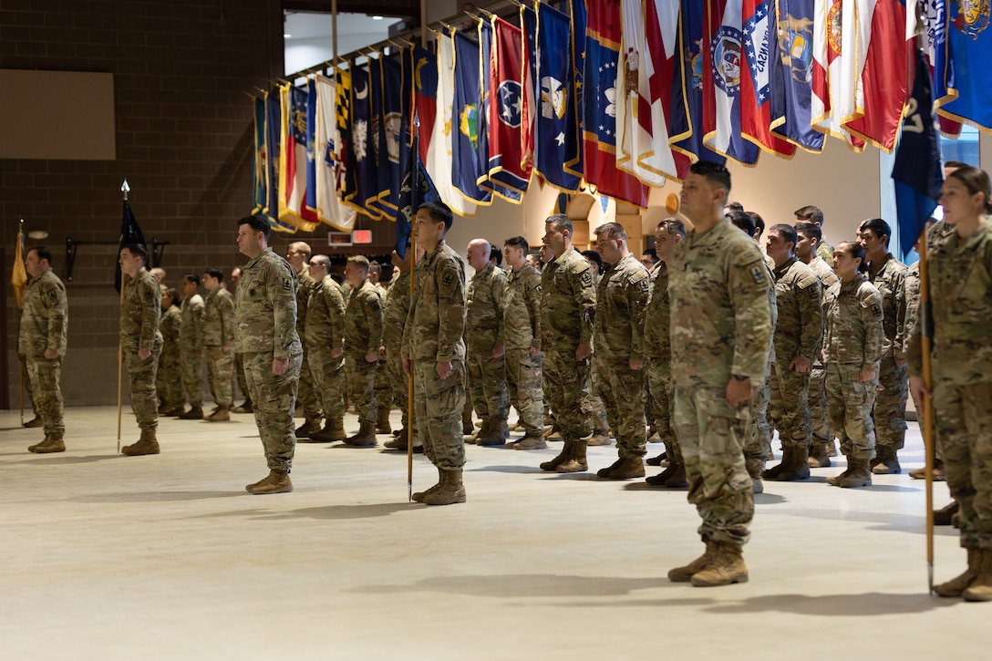 Alaska Army National Guardsmen with the 1st Battalion, 297th Infantry Regiment, stand at attention during a change of command ceremony Oct. 20, 2024, at Joint Base Elmendorf-Richardson, Alaska.