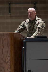 Alaska Army National Guard Lt. Col. Christopher Dailey, the incoming commander, gives his first instructions to the 1st Battalion, 297th Regiment, during a change of command ceremony on Oct. 20, 2024, at Joint Base-Elmendorf Richardson, Alaska.