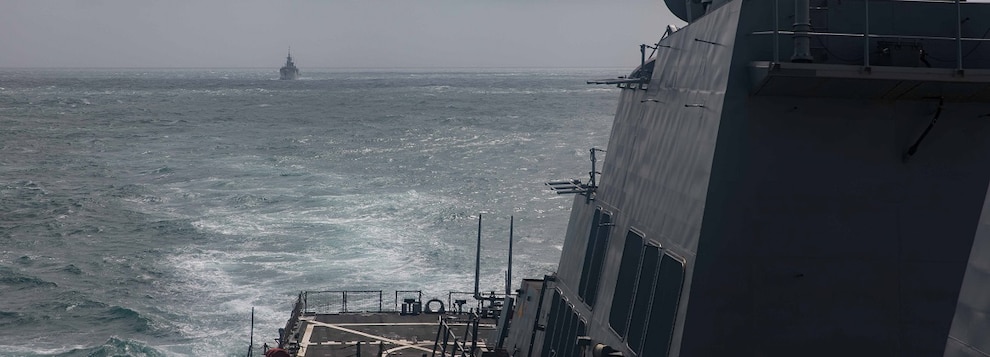 The Arleigh Burke-class guided-missile destroyer USS Higgins (DDG 76) conducts bilateral operations with the Royal Canadian Navy while transiting the Taiwan Strait, Oct. 20.