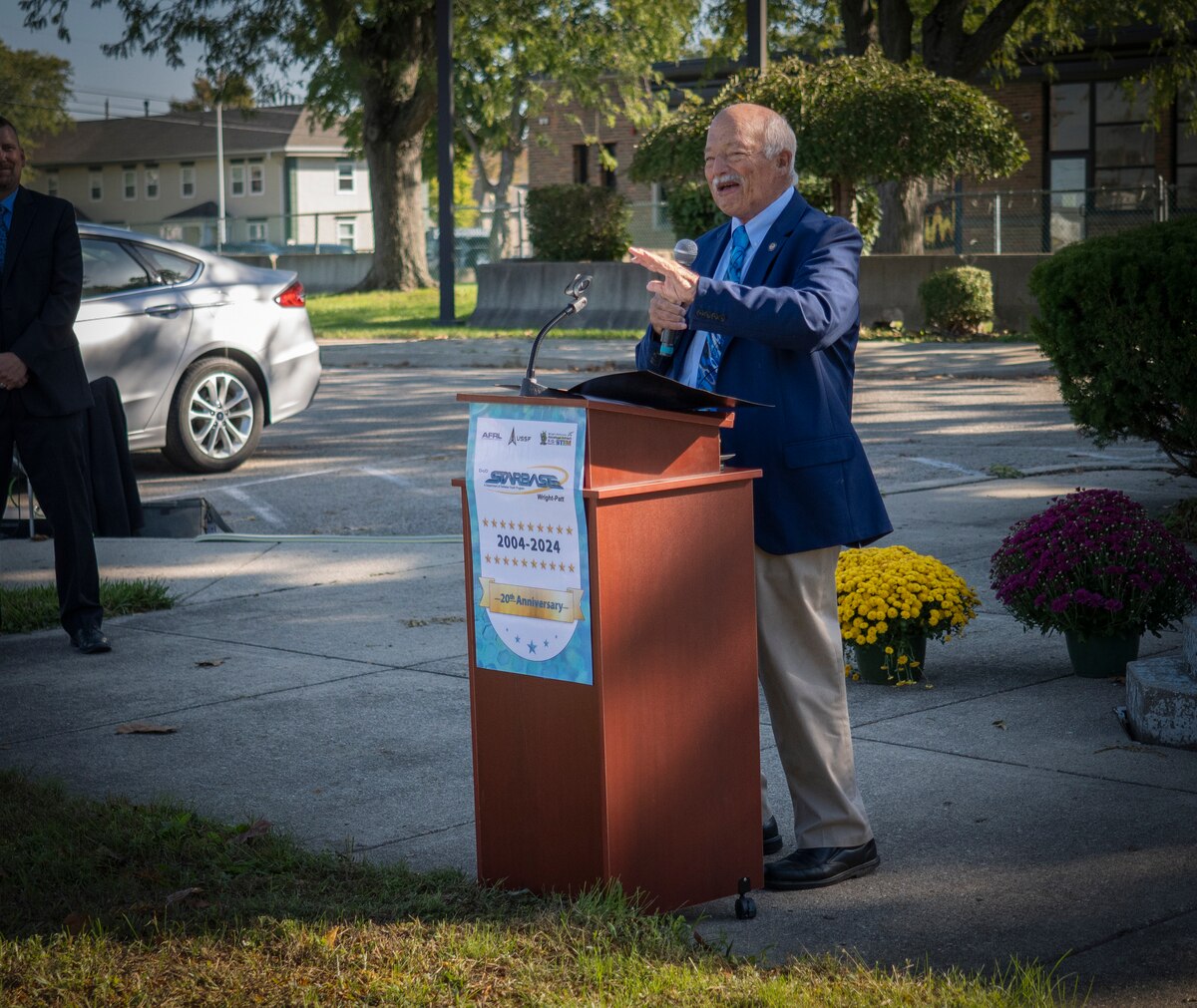 Ohio State Sen. Bob Hackett reads a proclamation from the Ohio Senate, signed by himself and Senate President Matt Huffman, as  Air Force Research Laboratory,  leaders and community members celebrate the 20th anniversary of the Department of Defense STARBASE Wright-Patt program Oct. 4, 2024, at a Child Development Center on Spinning Road in Dayton, Ohio. “Recognition of this memorable milestone is a fitting tribute to DOD STARBASE Wright-Patt, for since its inception it has played a valuable role in encouraging young people to explore [science, technology, engineering and math] as part of their future endeavors,” Hackett read from the proclamation. “We are certain that in the years to come it will continue to help students become capable and well-rounded individuals.” (U.S. Air Force photo / Keith Lewis)