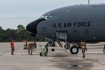 Members of the 927th Maintenance Group and the 6th Maintenance Group work together to prepare a KC-135 Stratotanker aircraft to evacuate MacDill Air Force Base, Florida, Oct. 6, 2024. The aircraft evacuation is part of MacDill’s preparations for Hurricane Milton forecasted to impact the west coast of Florida later this week. (U.S. Air Force photo by Staff Sgt. Leah Ritchey)