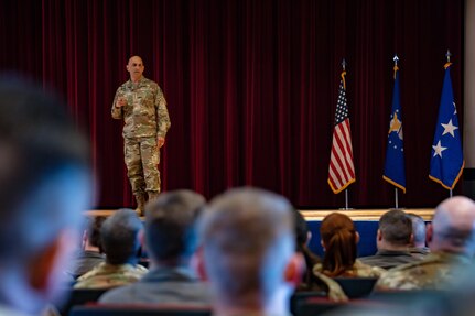 U.S. Air Force Lt. Gen. Brian Robinson, commander of Air Education and Training Command, addresses Team Sheppard during an all call