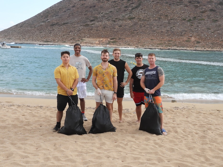 Sailors assigned to Naval Support Activity (NSA) Souda Bay, Greece, pick up litter at Stavros Beach, Chania, Greece, during a community outreach event on Oct. 17, 2024.