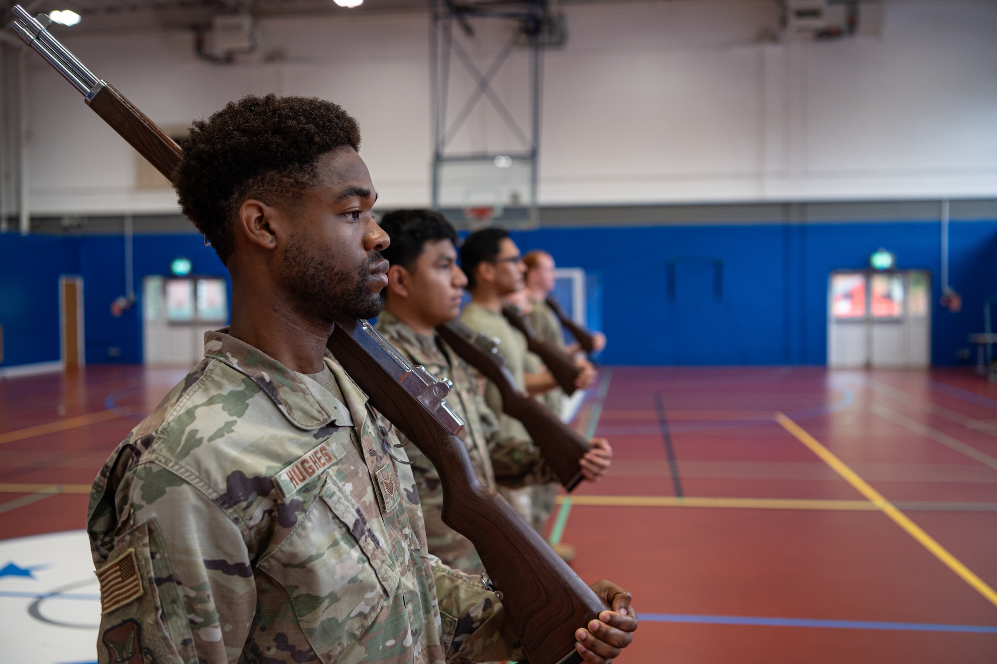 The Royal Air Force Mildenhall Honor Guard perform rifle movements during a practice at RAF Mildenhall, England, Sept. 3, 2024.