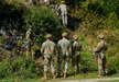Soldiers of Cobra Company, 2nd Battalion, 2nd Infantry Regiment, 3rd Brigade Combat Team, 10th Mountain Division enhancing their skills in rappelling system safety with a Slovenian Soldier, left, assigned to the 132nd Mountain Infantry Regiment at Bohinjska, Slovenia, Oct. 1, 2024, during exercise Triglav Star 24. (U.S. Army photo by 1Lt. Ashby Roloff)