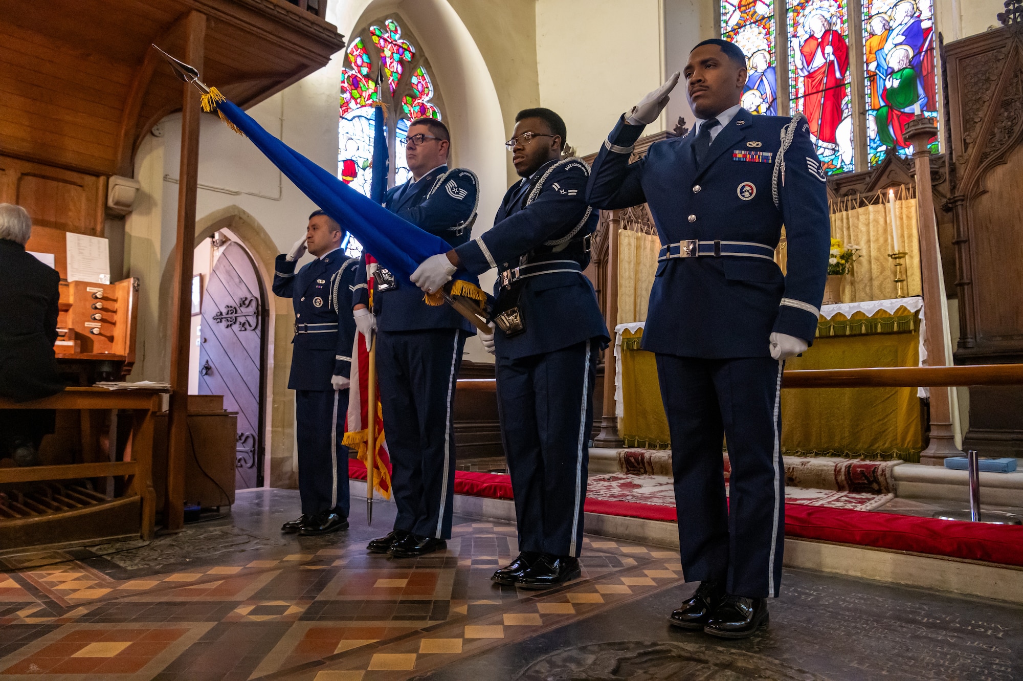 U.S. Airmen Mildenhall Honor Guard perform ceremonial duties during the playing of the U.K. national anthem at the St. Andrews Church, Honingham Norfolk, England, Oct. 20, 2024.