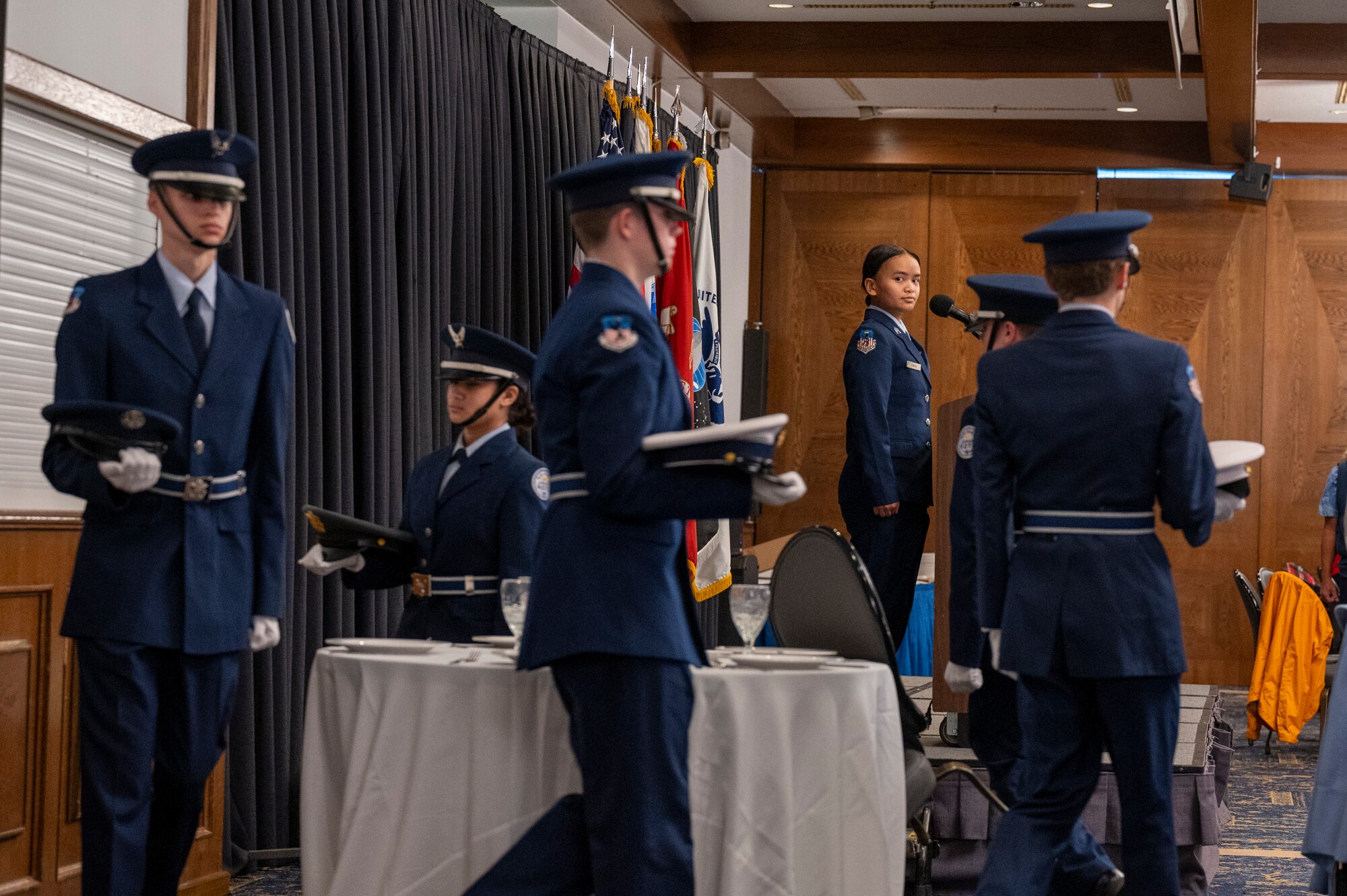 Members from the Ramstein High School Junior Reserve Officers’ Training Corps perform a POW/MIA Missing Man Table ceremony during the 2024 Military Retiree Appreciation Day event at Ramstein Air Base, Germany, Oct. 21, 2024.