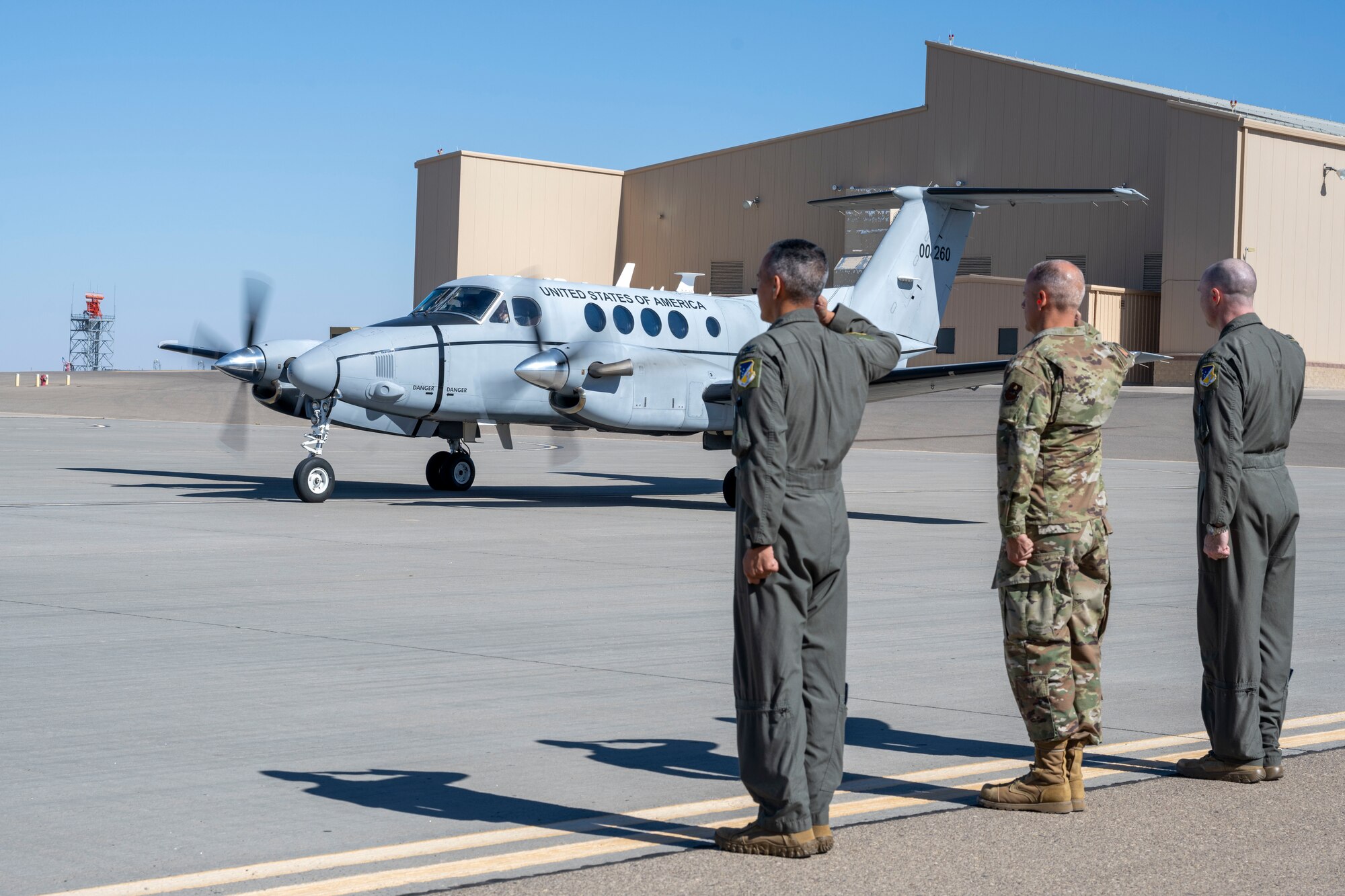 Holloman Leadership salute for the arrival of U.S. Air Force Maj. Gen. Gregory Kreuder, 19th Air Force commander, and U.S. Air Force Chief Master Sgt. Keith Scott, 19th Air Force command chief at Holloman Air Force Base, New Mexico, Oct. 7, 2024. The 19th Air Force Command Team visited Holloman Air Force Base to evaluate the installation's capabilities, identify areas for improvement, and explore how the 19th Air Force can enhance support for the installation. (U.S Air Force photo by Senior Airman Isaiah Pedrazzini)