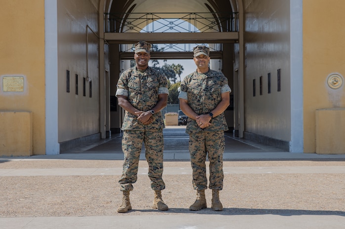 U.S. Marine Corps Brig. Gen. James A. Ryans II, commanding general, Marine Corps Recruit Depot San Diego and Western Recruiting Region, left, and Brig. Gen. David R. Everly, director Manpower Plans and Policies Division, Manpower and Reserve Affairs, right, pose for a photo at MCRD San Diego, California, Oct. 9, 2024. MCRD San Diego hosted an informative session on updates to the Marine Corps Order 5354.1G in order to provide guidance on the development and implementation of command prohibited activities and conduct policies. (U.S. Marine Corps photo by Cpl. Sarah M. Grawcock)