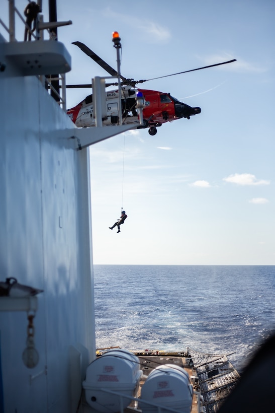 Coast Guard Cutter Bear (WMEC-901) conducts joint operations with a Coast Guard MH-60 Jayhawk helicopter aircrew, Aug. 20, 2024, while at sea north of Haiti. Bear’s crew conducted a 58-day homeland security and counter-drug patrol while operating in the Seventh Coast Guard District area of responsibility. (U.S. Coast Guard photo by Petty Officer 1st Class Jeremy Wilbanks)