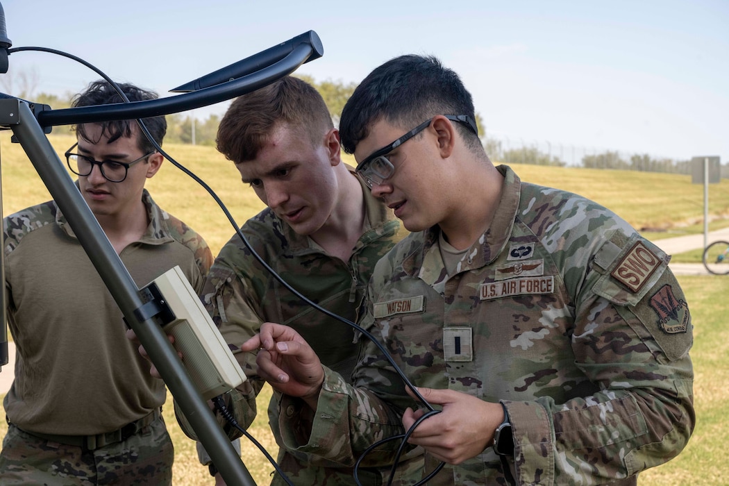 Airmen set up weather sensor