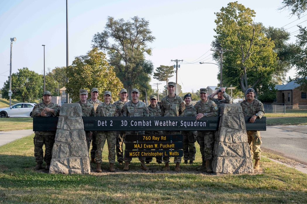 Airmen pose for a photograph