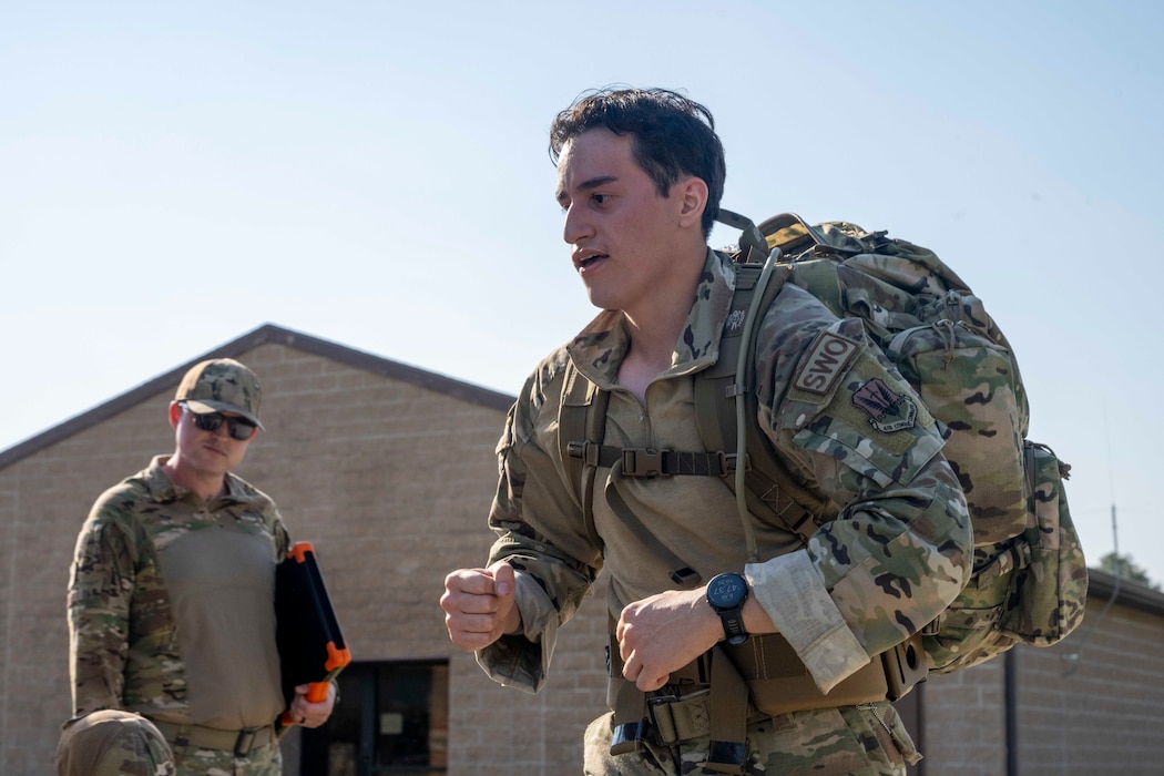 An Airman ruck marches