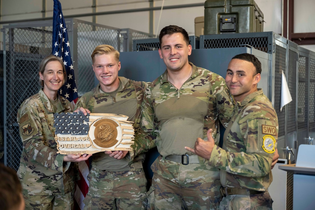 Airmen pose for a photograph