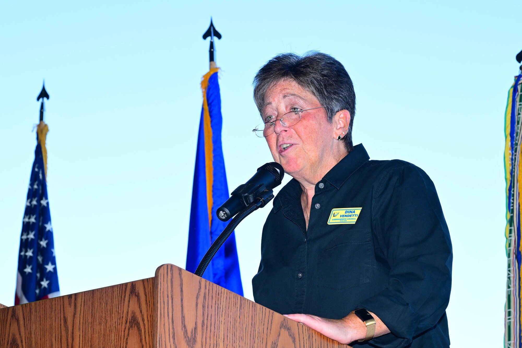 Dr. Dina Vendetti, president of the Central Delaware Chamber of Commerce and Air Mobility Command civic leader, speaks to attendees at the 2024 Honorary Commanders Induction Ceremony at Dover Air Force Base, Delaware, Oct. 22, 2024. Vendetti was the guest speaker for the event. (U.S. Air Force photo by Mauricio Campino)