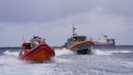 Members of the U.S. Coast Guard (USCG) Station Apra Harbor conduct a search and rescue exercise and crew exchange with members of the Korea Coast Guard (KCG) training ship KCG 3011 Badaro (바다로호) on Oct. 9, 2024, in Apra Harbor, Guam. USCG and KCG crews completed a successful week-long visit to Guam from Oct. 7 to 11, 2024, marked by shared exercises, subject matter expert (SME) exchanges, and a cultural 