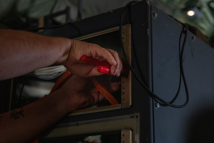 A 403rd Maintenance Squadron's Meteorological Equipment Technician's shop servicemember installed a KU Antenna on a WC-130J Super Hercules.