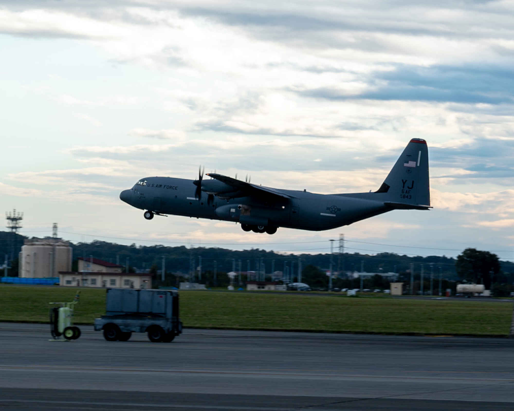A C-130J Super Hercules aircraft takes off.