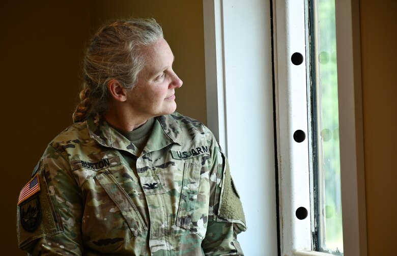 U.S. Army Col. Christina L. Burton, ARCENT engineer director, watches during the Assessments and Solutions for Survivability from Emerging Threats live-fire demonstration at a U.S. Army Engineer Research and Development Center test range at Fort Johnson, La., Sept. 18.